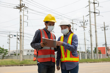 Teamwork Engineer working outdoor onsite service, electrical engineer team