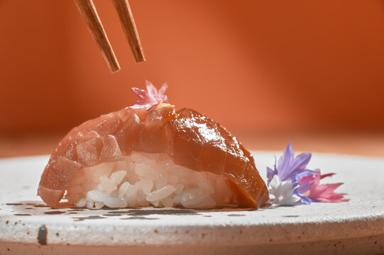 asian food modern japanese cuisine sushi with tuna akami Japan, pickled rice, wasabi, nikiri sauce 