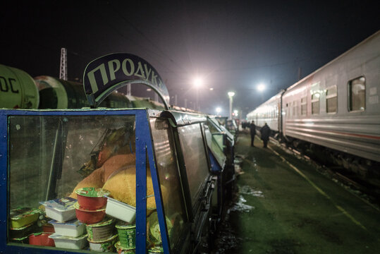 Food stall in a stop of the trans siberian train at night.
