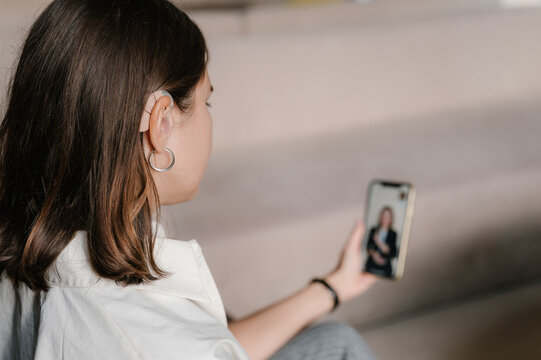 Deaf female entrepreneur making video call