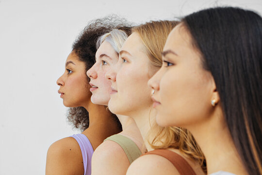 group of multiracial different women in profile
