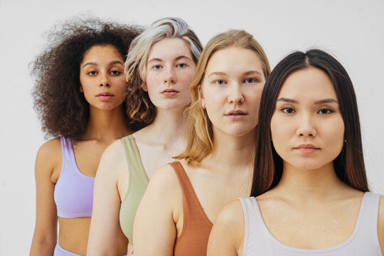 Multiracial female models looking at camera