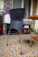 Chair with black backrest and metal legs