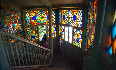 Tourists on stairs of kaleidoscope house