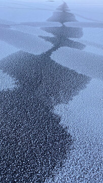 winter pattern like a Christmas tree, snow-covered ice