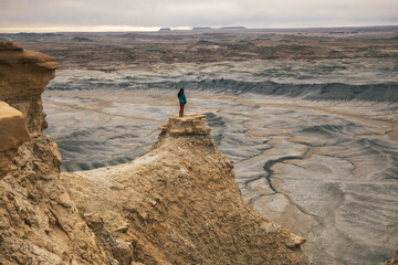 woman in bizzare desert