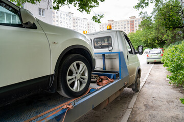 car is transported on tow truck.transporting cars after accidents and breakdowns