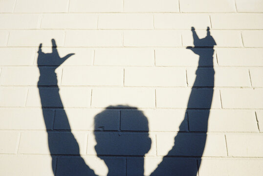 Person Creating Shadows On Wall, Shot On Film