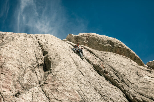 climber under blue sky