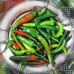 Peppers in steel strainer