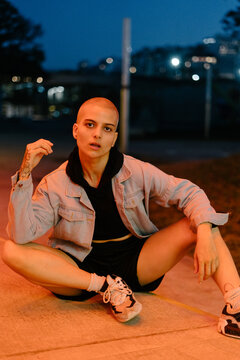 non binary gender portraiture at night with color lights