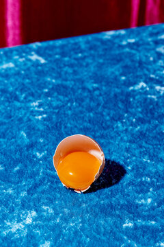 egg yolk in the cracked eggshell