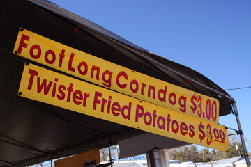 Food Vendor at County Fair With Signs