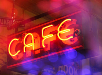 Vintage Neon Cafe Sign With Colorful Bokeh