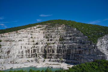 Italian marble quarries. Panorama of developed mountain fossils. Aerial view of an abandoned marble...