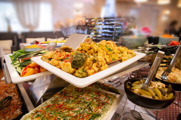 broccoli baked in batter on a white plate