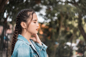 A depressed teenage asian girl after being heartbroken, bullied or ostracized.