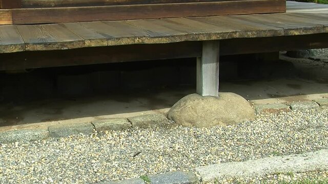 Post supporting the engawa (porch) of a Japanese style house.