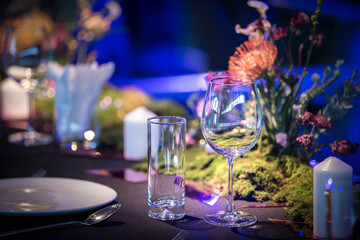 Decoration wedding, bouquet and glasses of bride and groom with champagne at a wedding