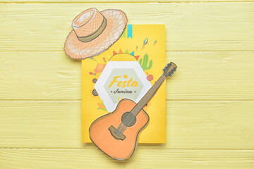 Greeting card and decor for Festa Junina (June Festival) on color wooden background