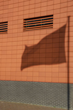 wall with shadow of flag