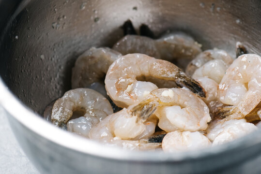 Marinating shrimp with garlic butter