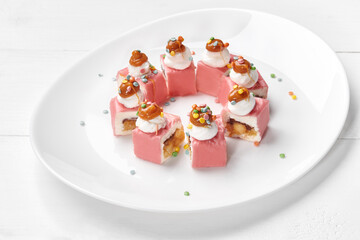 Sweet sushi roll with cream cheese and caramelized banana
