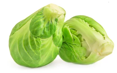 Foto auf Acrylglas Brussel Sprouts heap isolated on white background. Fresh raw  brussels cabbage top view. © nataliazakharova