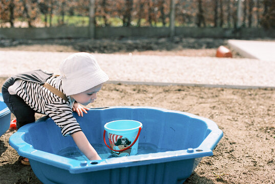Little boy playing with water 