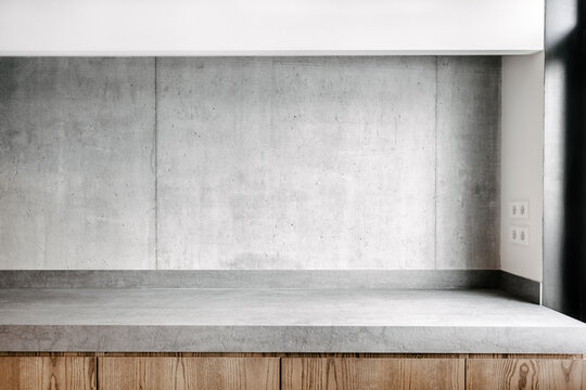 Minimal kitchen tabletop in raw concrete