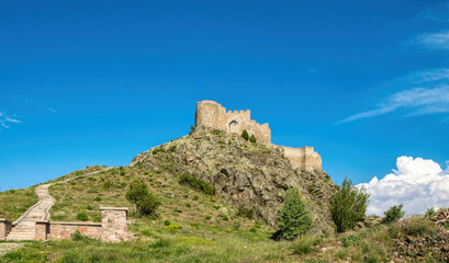  Ruined fortress and mountain valley