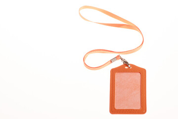 Blank badge mockup color orange isolated on white. Plain empty name tag mock up hanging on neck with string, name Tag.