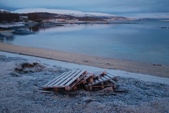 garbage, old pallet on a beach
