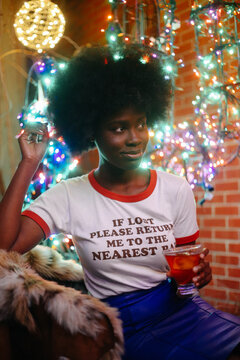 Young Beautiful Black Woman With Afro At The Bar