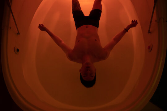 Asian man floating
