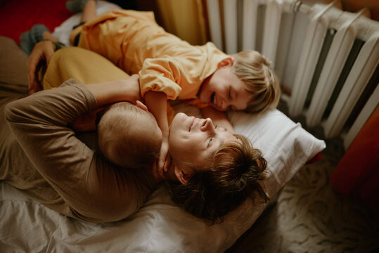 
young mother and her sons