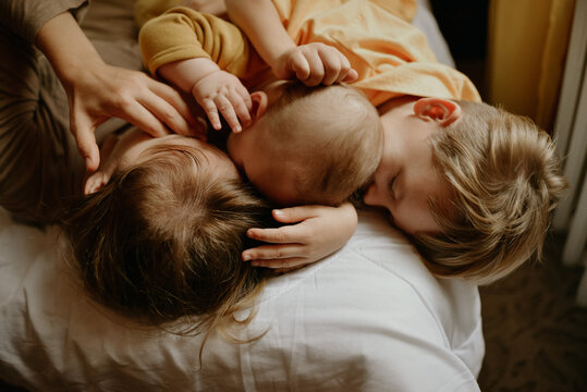 
young mother and her sons