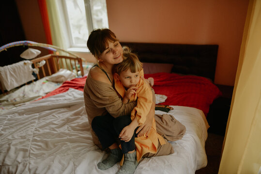 Young woman and her little son