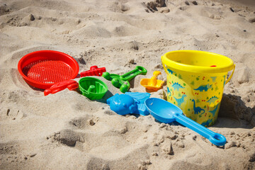 Fototapeta na wymiar Children toys for relax or playing at beach. Summer, vacation time and child development