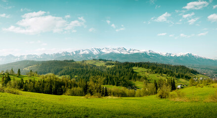 Panorama of snow-capped Tatry Mountains on Podhale in Poland