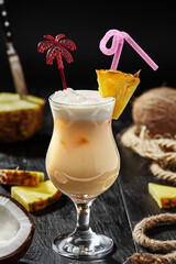 Non-alcoholic pina colada cocktail with pineapple juice and coconut milk