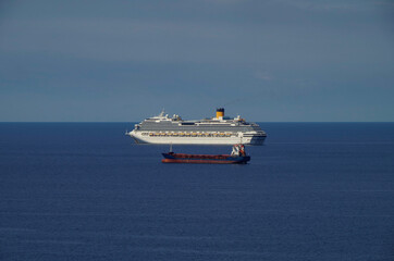 Costa cruiseships or cruise ship liners Pacifica, Fortuna and Favolosa anchored at sea offshore of...