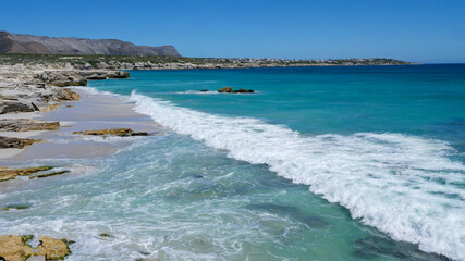 Coastal view towards Klipgat Cave in the Walker Bay Nature Reserve and Die Kelders (de Kelders). Overberg, Western Cape. South Africa