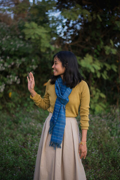 Asian lady in meadow