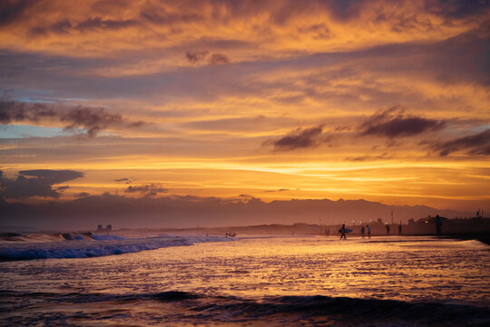 Peaceful beach and sky turn into beautiful sunset color