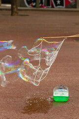 Soap bubbles with rope, selective focus.