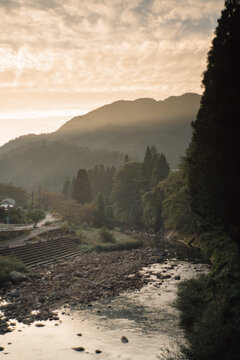 Early Morning In Japanese Small Village By The River