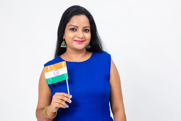 Pretty Indian female holding Indian national flag.