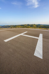 Empty helipad on top of a peak in a country side remote location