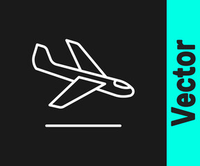 White line Plane landing icon isolated on black background. Airplane transport symbol. Vector